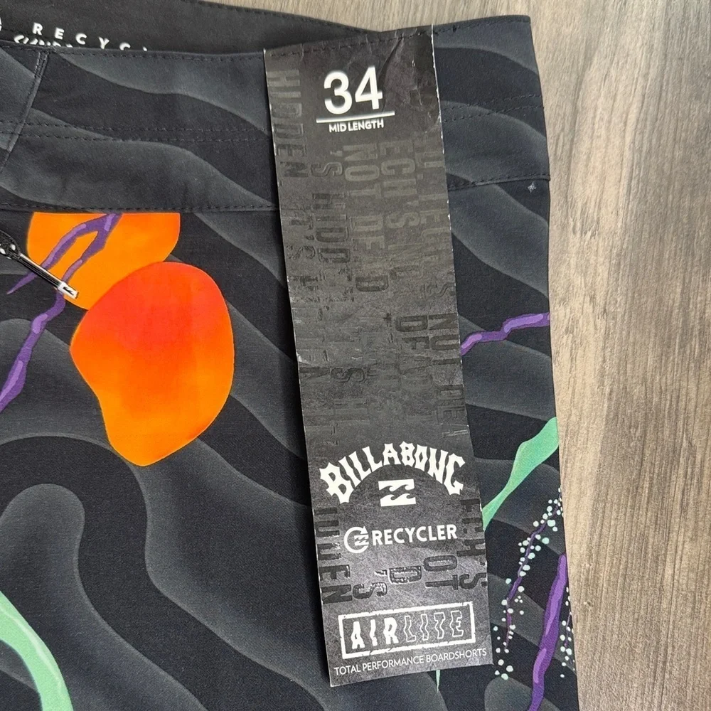Billabong Black Board Shorts with Orange and Green Design